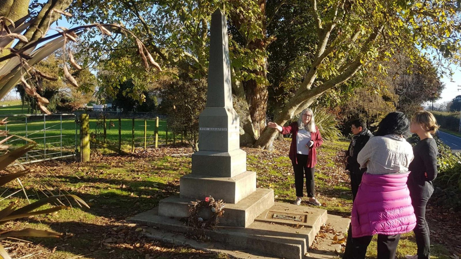 Associate Professor Joanna Kidman and co-researchers look at a memorial to the 1864 battle at Ōrakau.