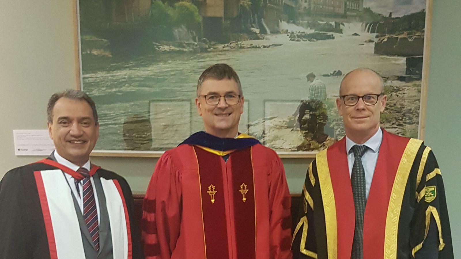 Nicholas Long Inaugural Head and shoulders portrait of Professor Ehsan Mesbahi, Professor Nicholas Long, and Professor Nic Smith dressed in academic robes.
