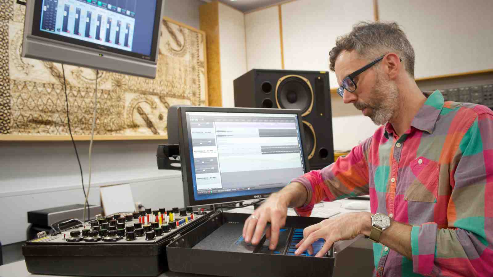 Dr Dugal McKinnon in the revamped Lilburn Studios at Te Kōkī New Zealand School of Music.