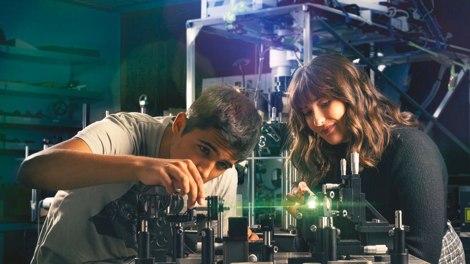 Science students Aleksa Djorovic and Phoebe McDougall experiment with light in Victoria’s Raman Laser Laboratory.