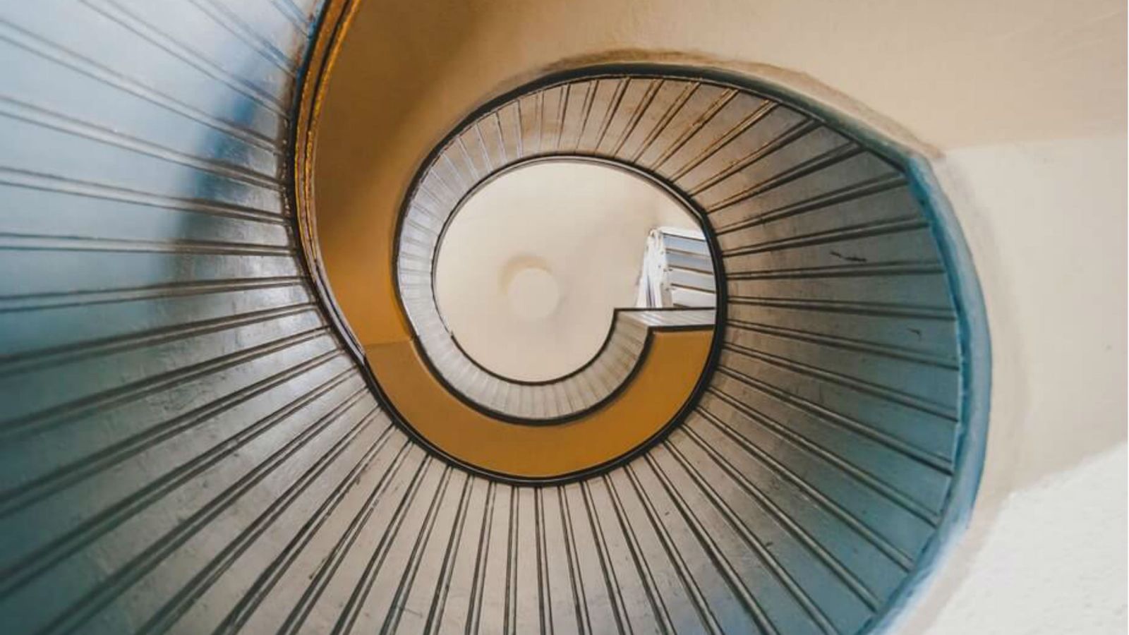 Underside view of a spiral staircase.