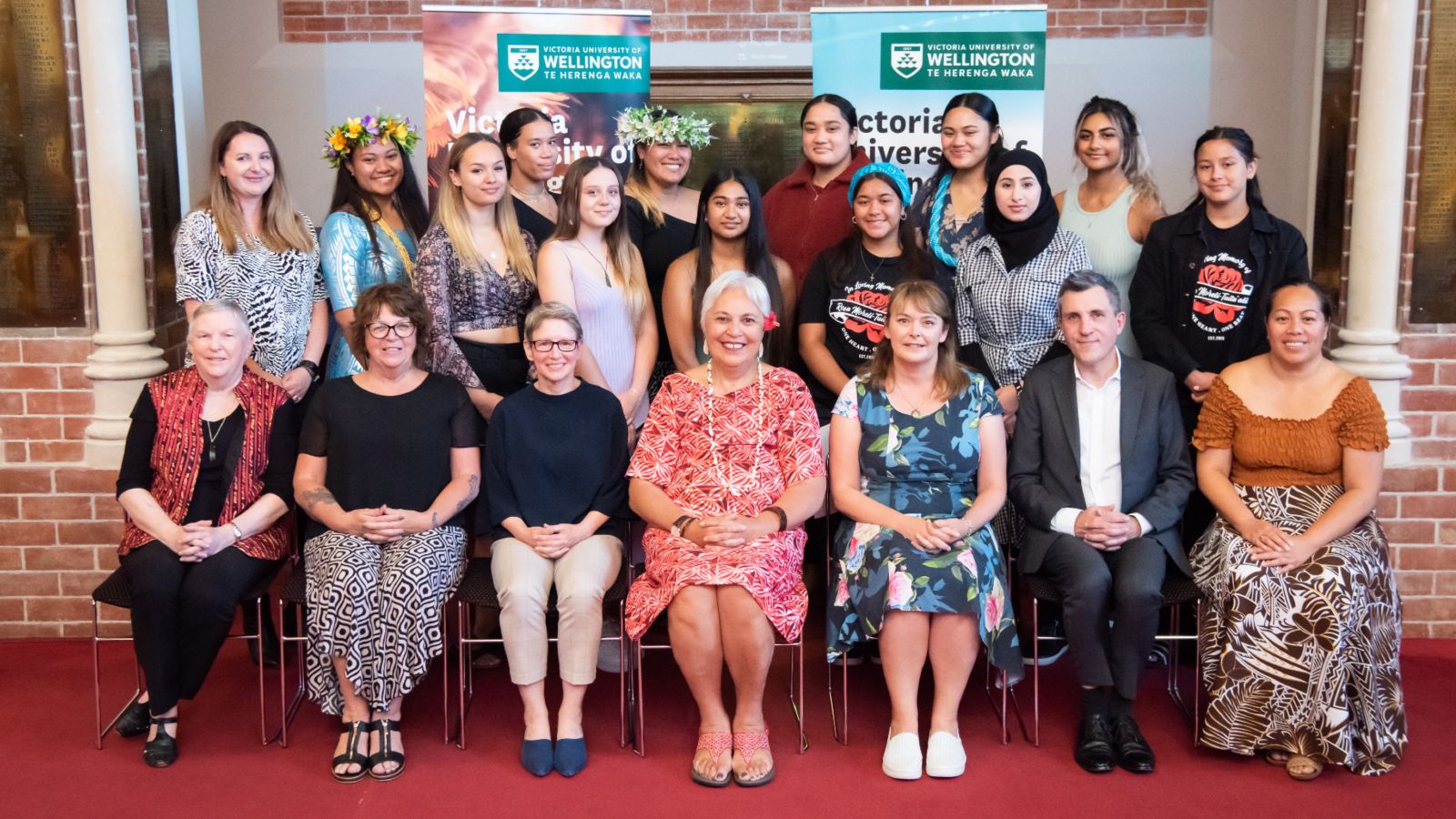 12 scholarship recipients with university staff