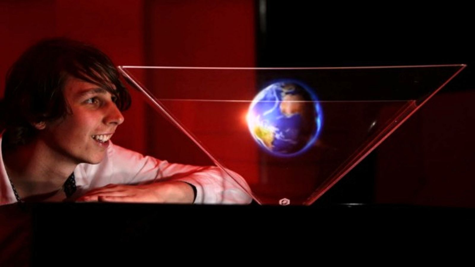 Chris Mather staring at hologram