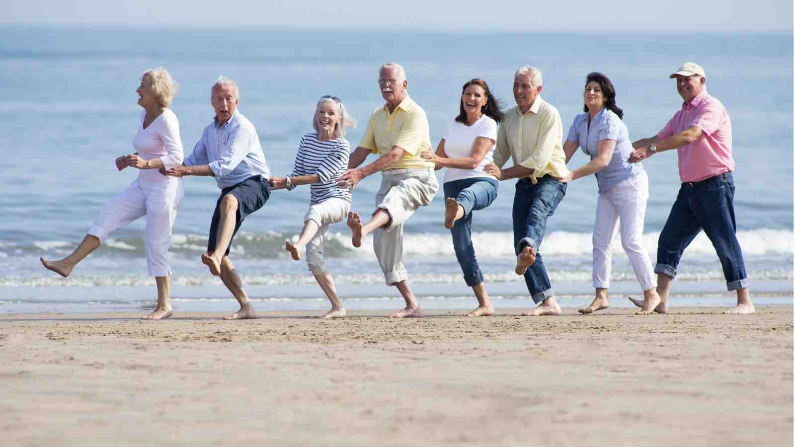 People dancing on a beach