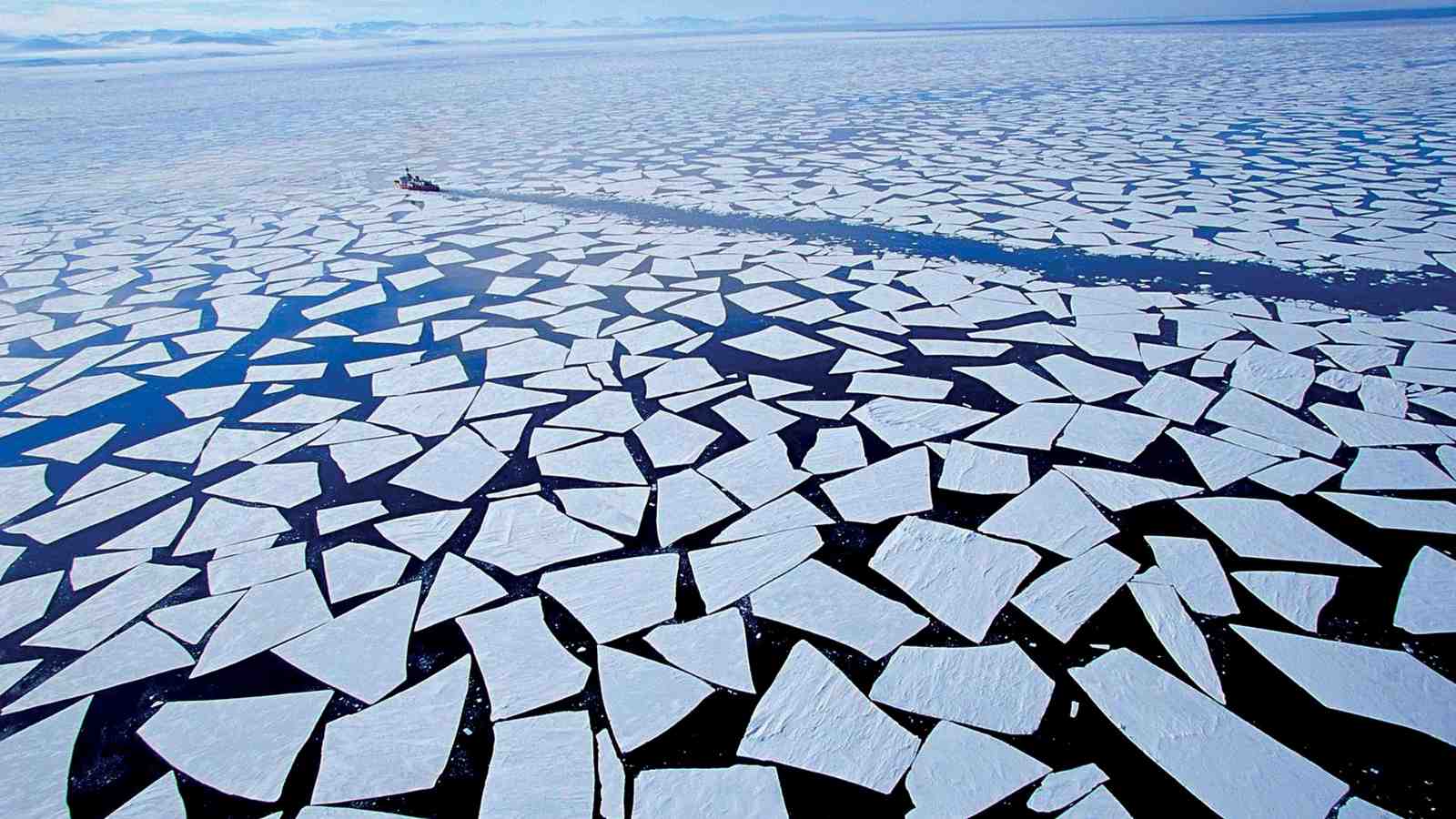 Broken ice sheets out at sea