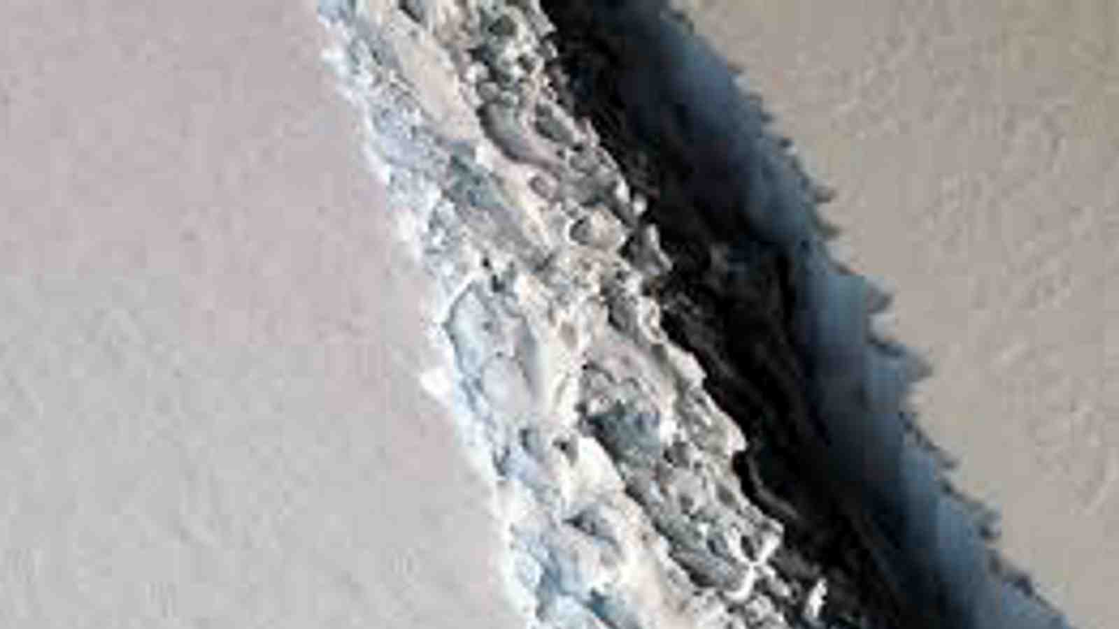 A crack forming in an ice shelf.