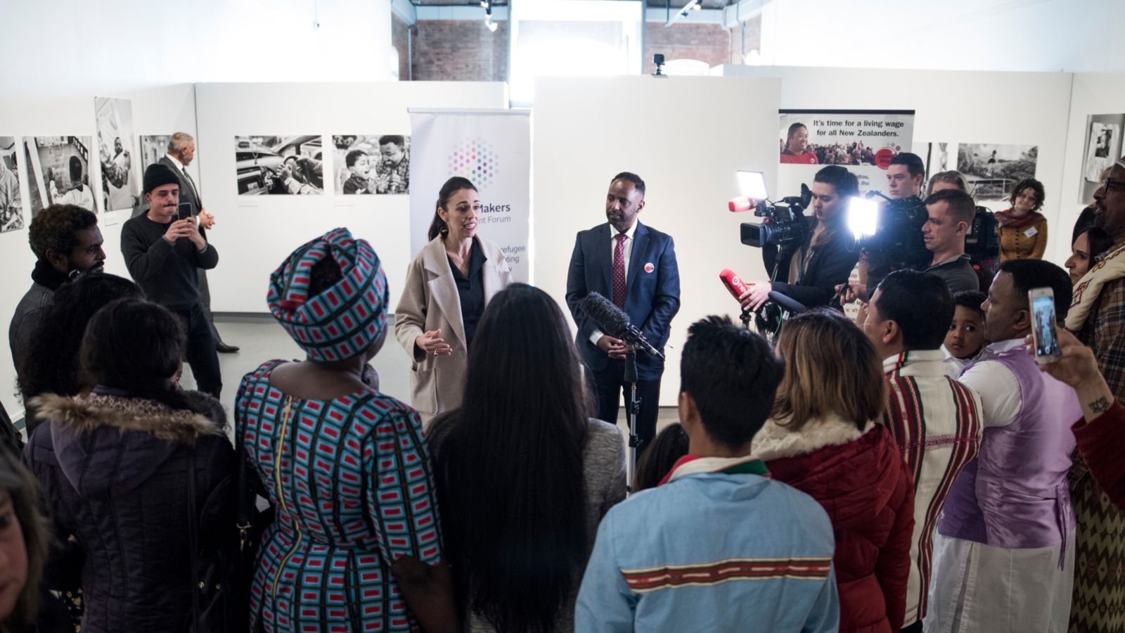 Ibrahim Omer with Prime Minister Jacinda Ardern 