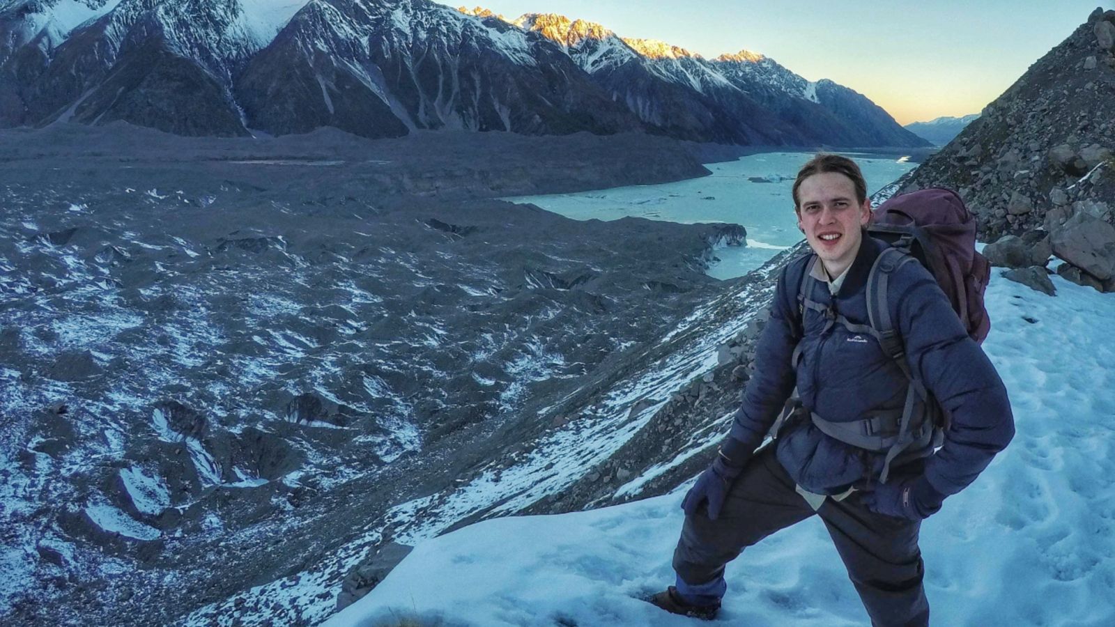 Clarrie Macklin standing by Haupapa Tasman Glacier 