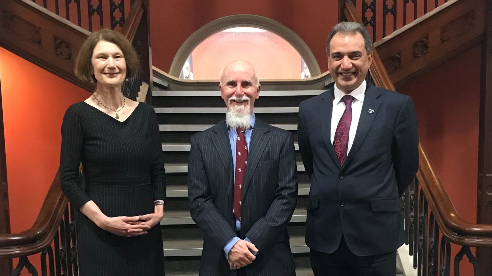 Three academics on the stairs of the Hunter building, from left to right Jennifer Windsor, Martyn Coles and Ehsan Mesbahi.