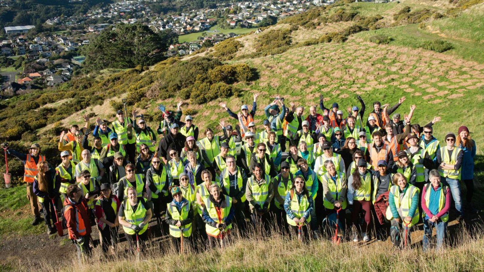 Group photo of volunteers at tree-planting day.