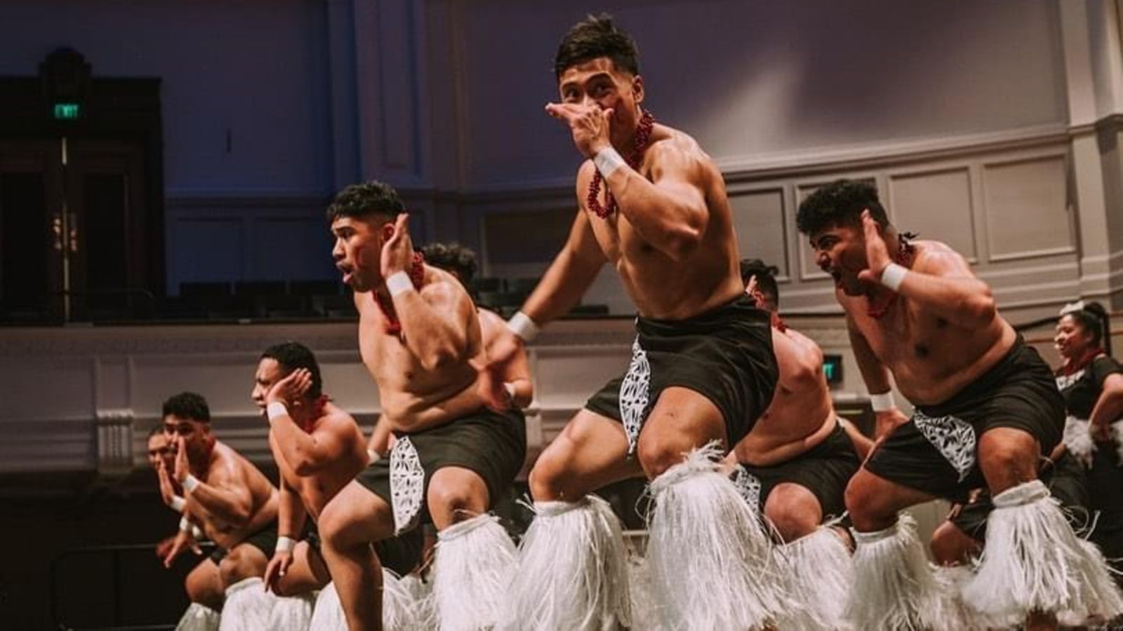 Samoan club members participate in a performance. 