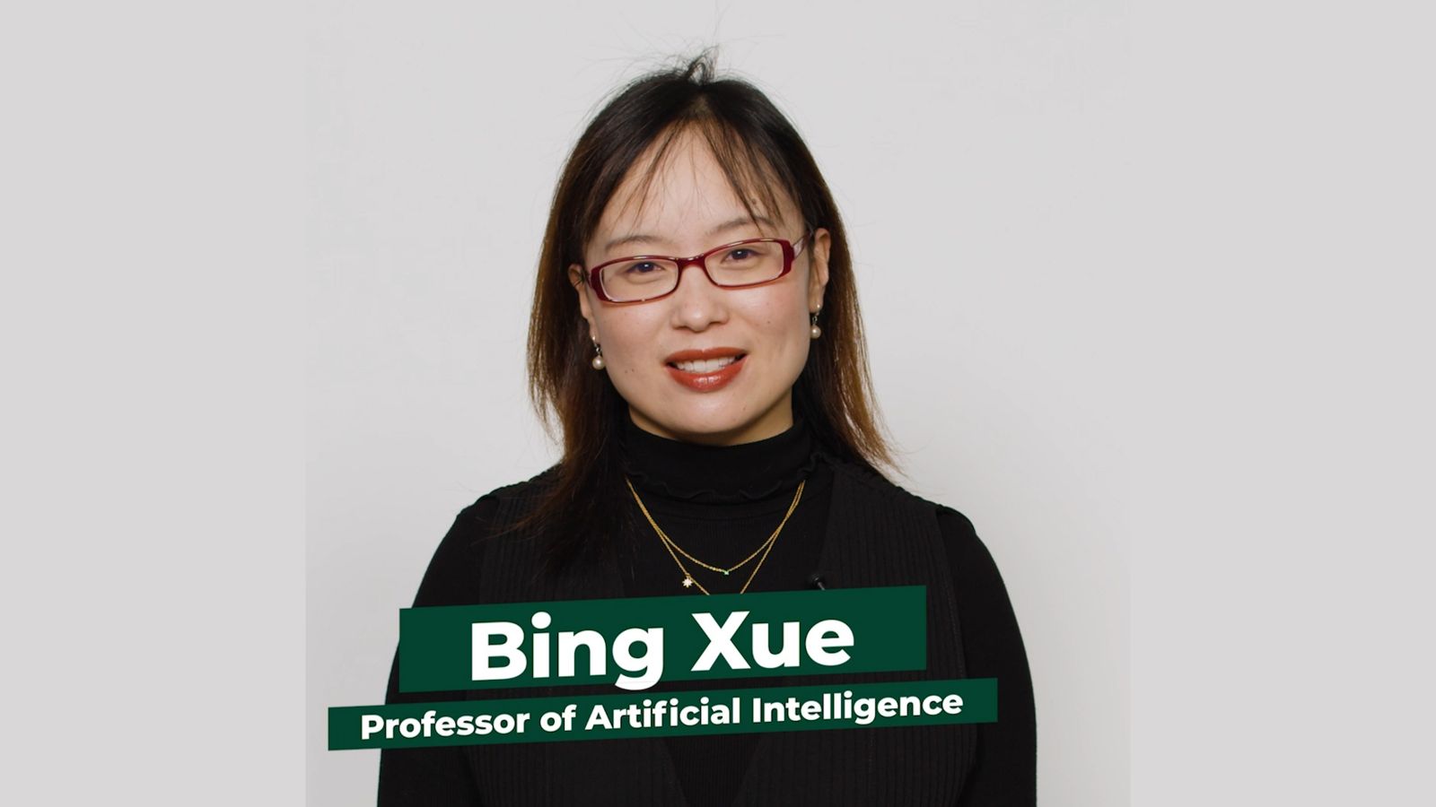Professor of Artificial Intelligence Bing Xue faces the camera against a white background