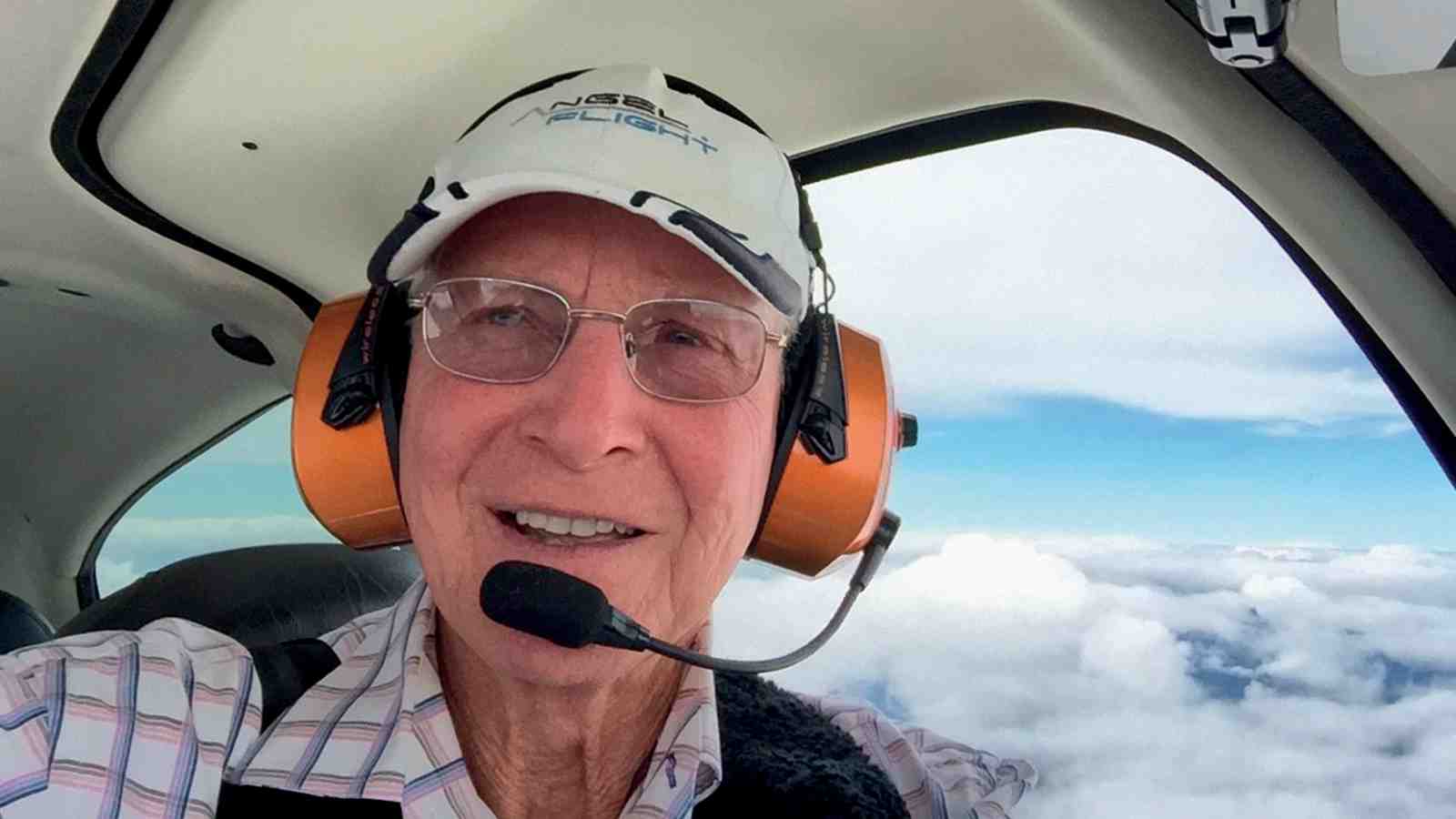 Lance Weller in the cockpit of a plane while he is flying.