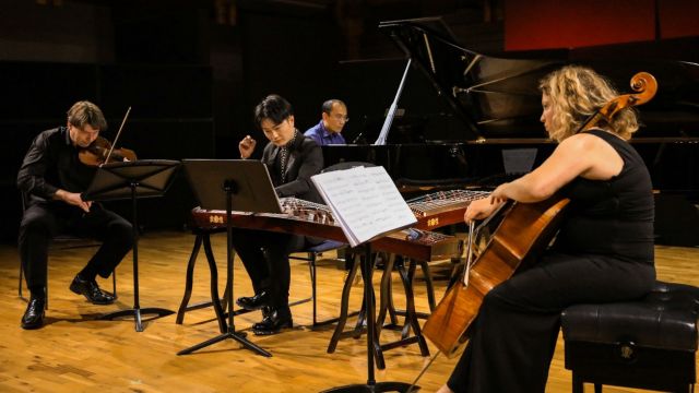 NZSM piano trio performing with Liu Le – Liu Le from Zhejiang Conservatory of Music performing Guzheng with NZSM Piano Trio at the concert 'China Crossing'. Photo: Yezhu Zhao