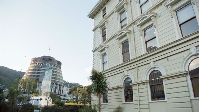 The law school building in the foreground with the beehive in the background.