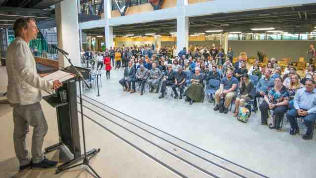 Dean of the School of Architecture and Design presents to people at the Student Awards Night.