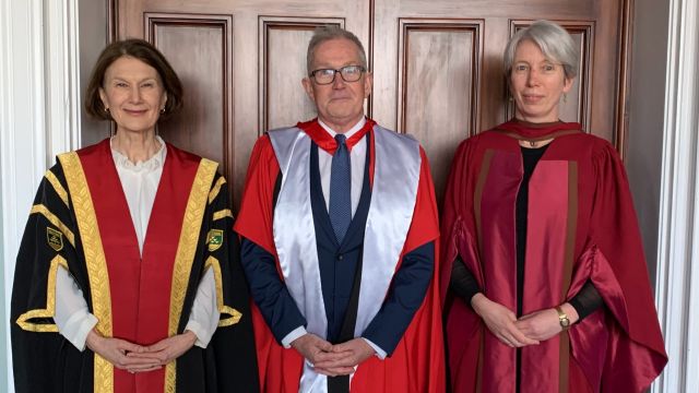Three academics wearing formal gowns, from left to right Acting Vice-Chancellor Professor Jennifer Windsor, new Professor David Capie, and Associate Dean Dr Diana Burton.