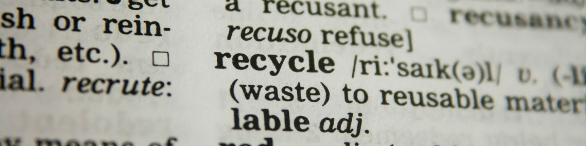 Banner image – a zoomed in version of text in a dictionary focused on the word “recycle” and its description.