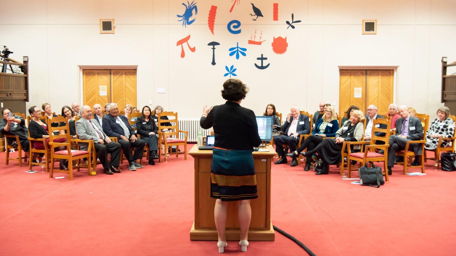 Bev Lawton presenting to an audience