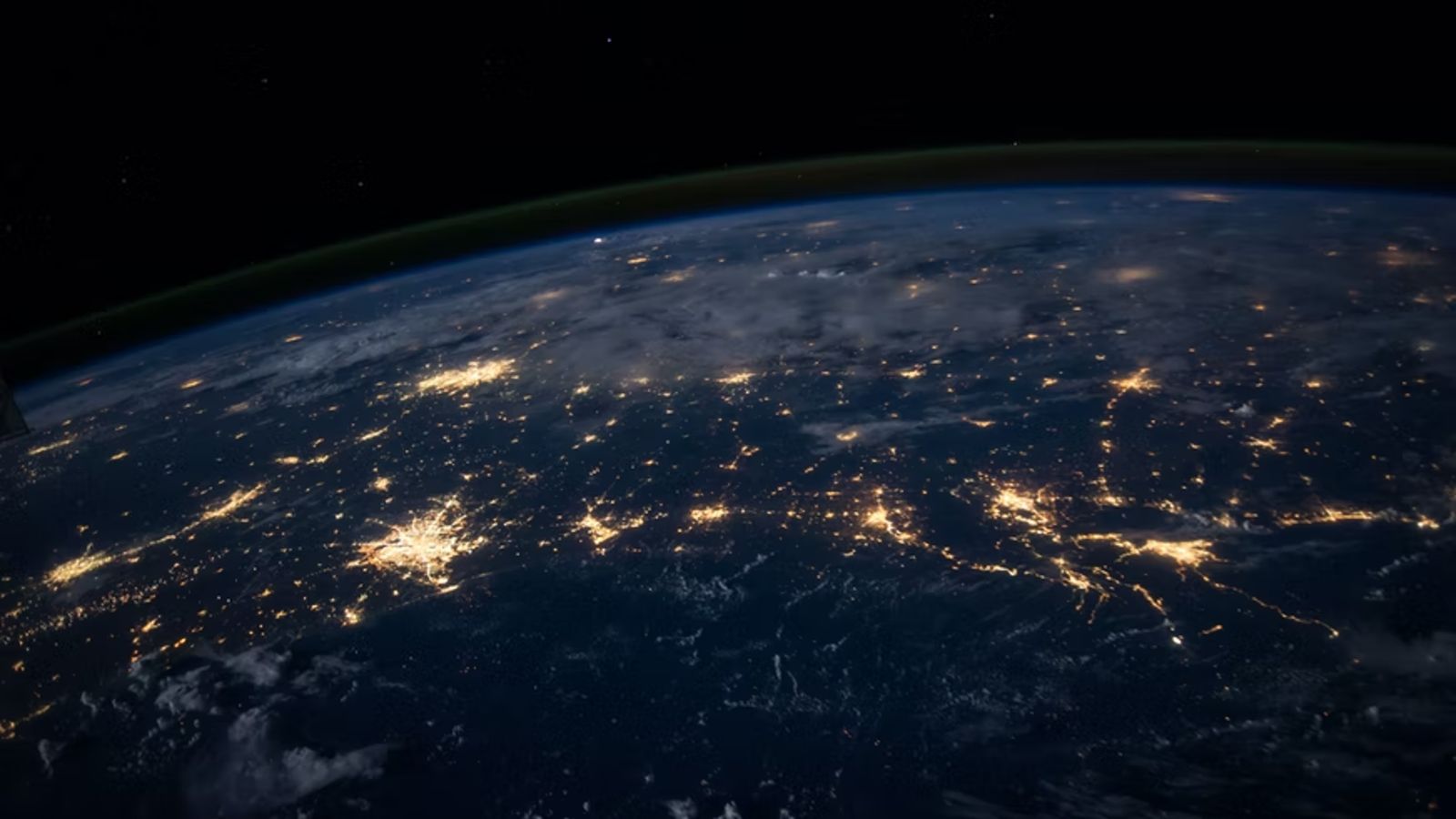 Image of earth from outer space showing a network of lights