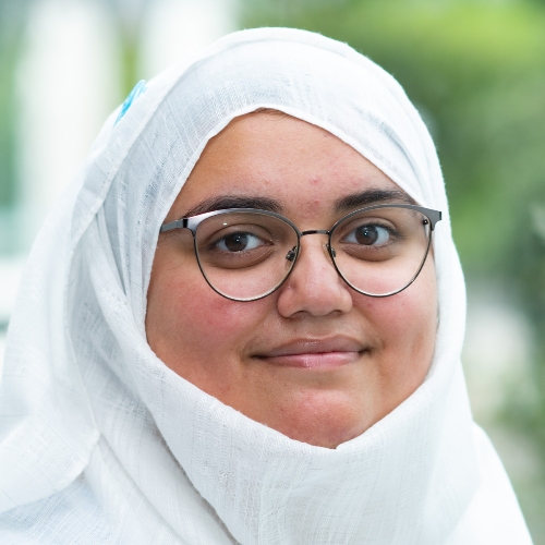 Close up of woman in white headscarf