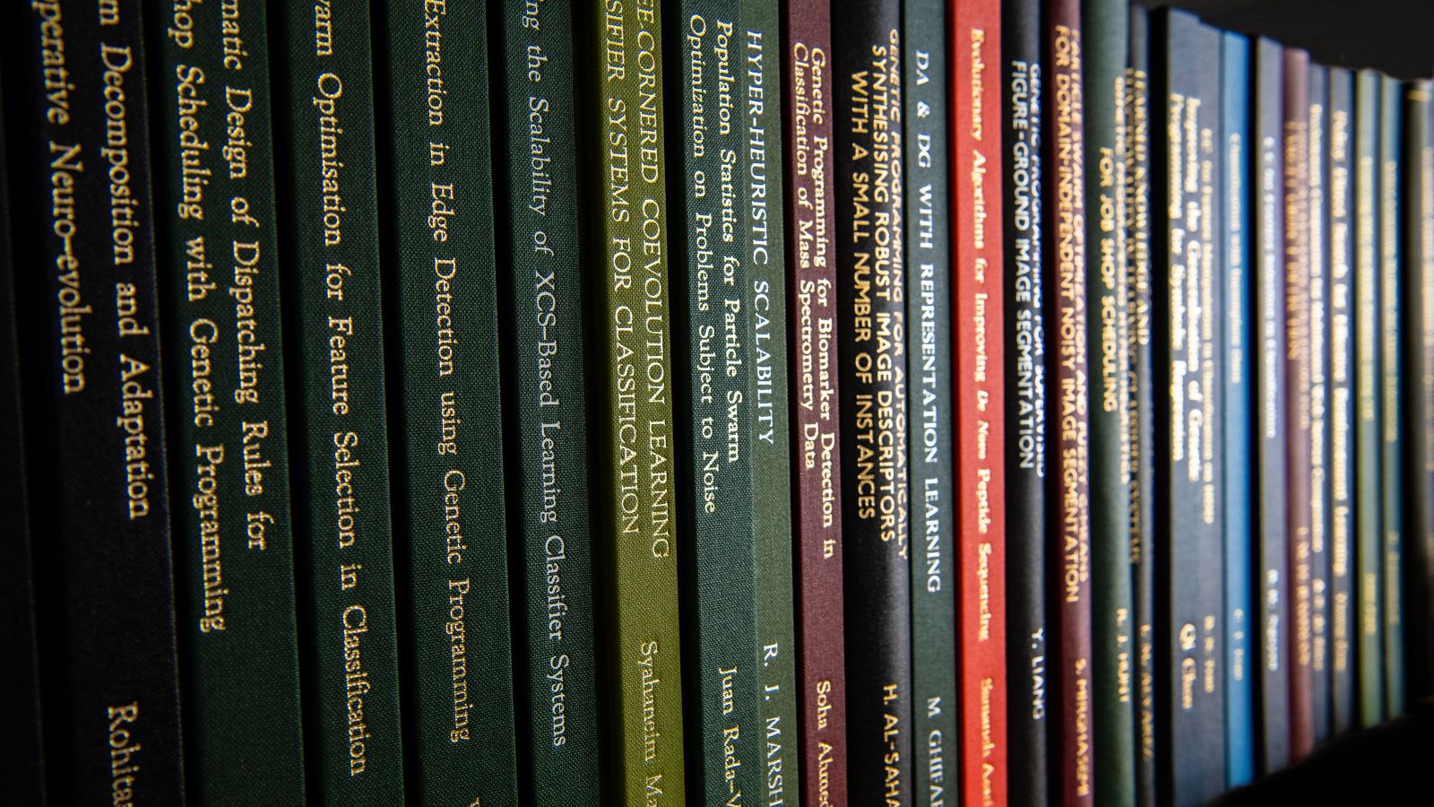A row of spines of book publications
