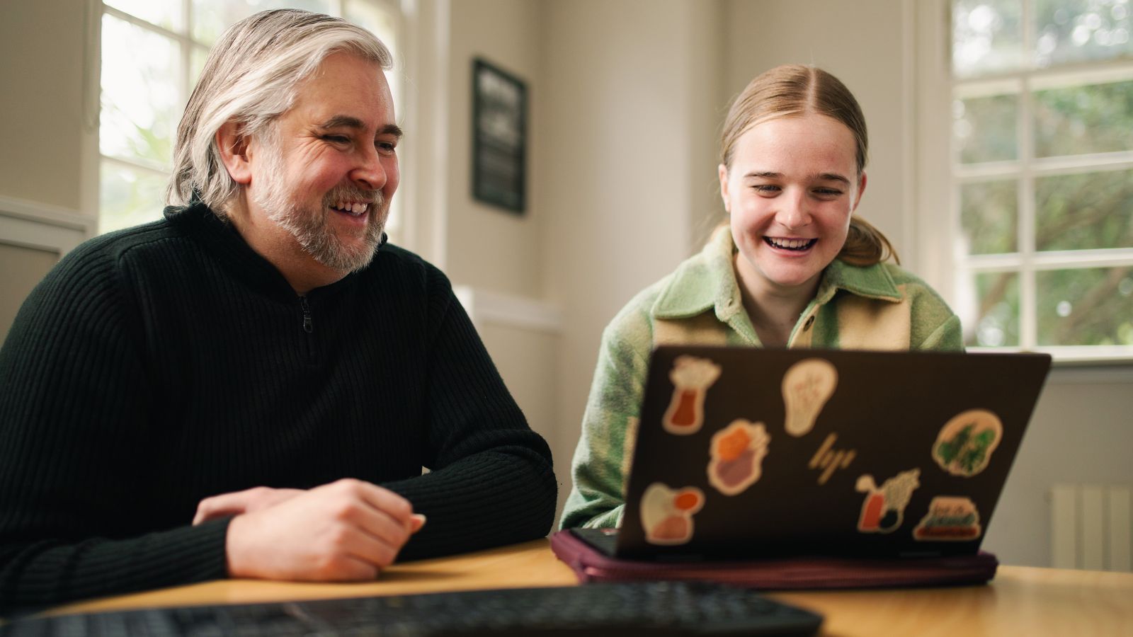 A Disability Services staff member showing a student some online tools