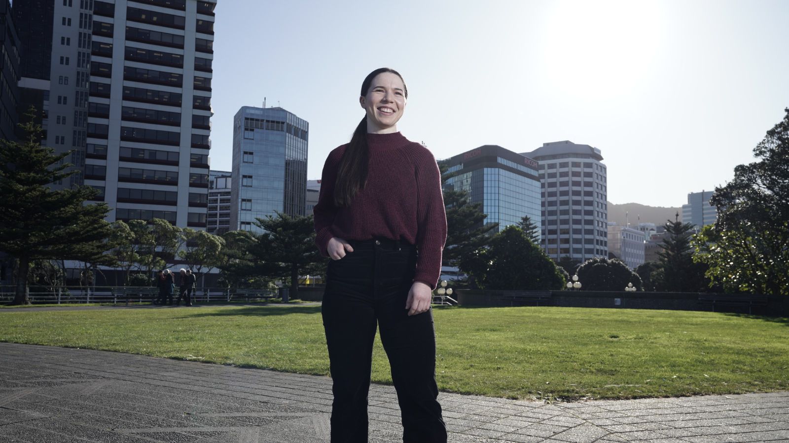 Person standing in CBD Wellington.
