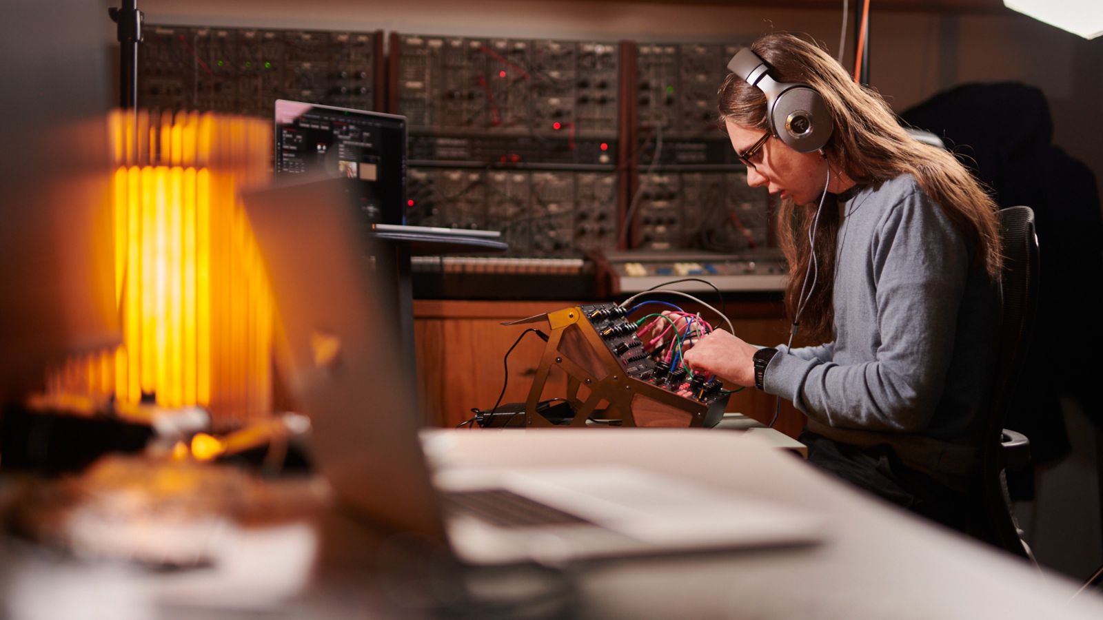 Person operating sound equipment.