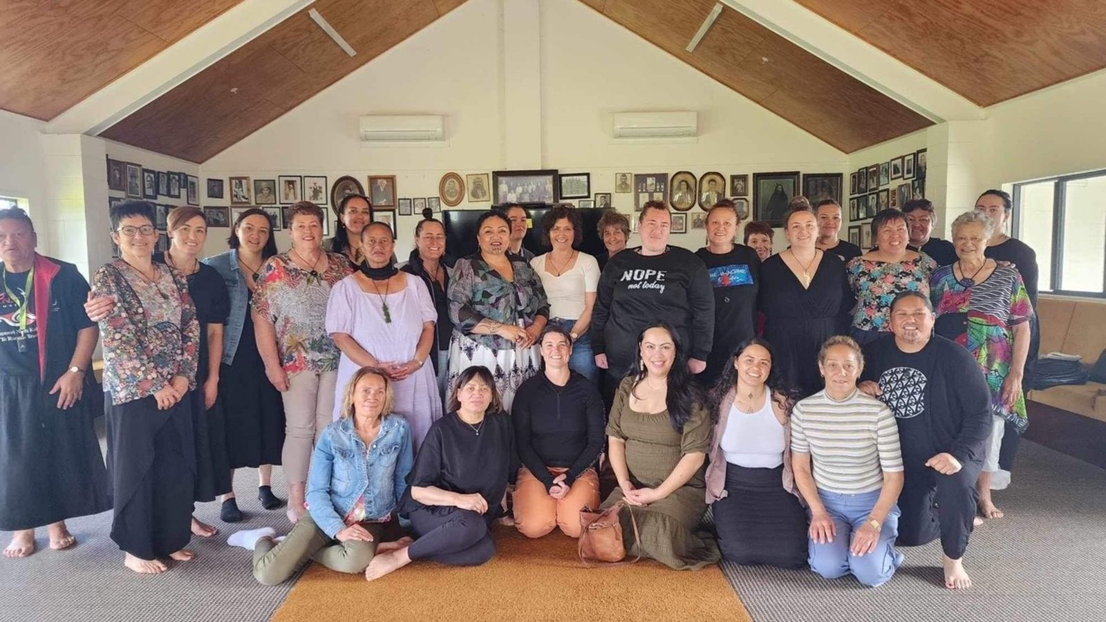 Maori Nurse Practitioners gathered at Waimanoni marae and posing for a group photo