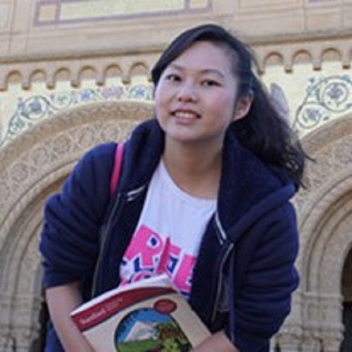 Young Asian woman outside building