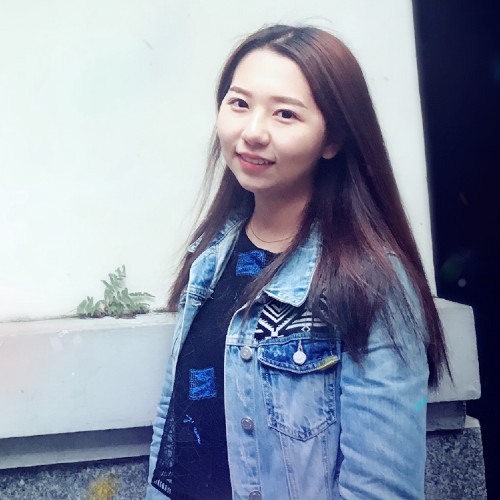 Young Asian woman in denim jacket