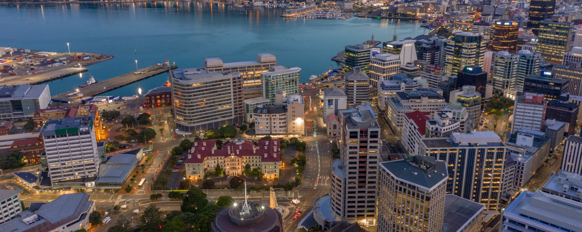 View of the Old Government Buildings from the air and Wellington City and Harbour in the background