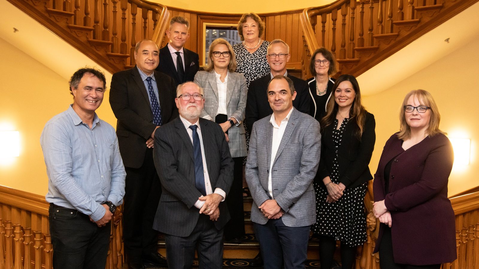 Launch of the Centre for Justice Innovation distinguished guests in attendance to the launch of the Centre for Justice Innovation standing in the staircase of the Faculty of Law Wellington