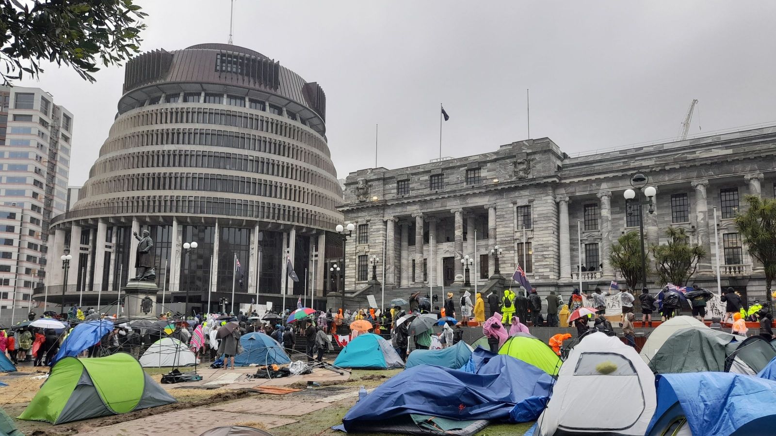 Wellington Parliament - beehive with tents out front
