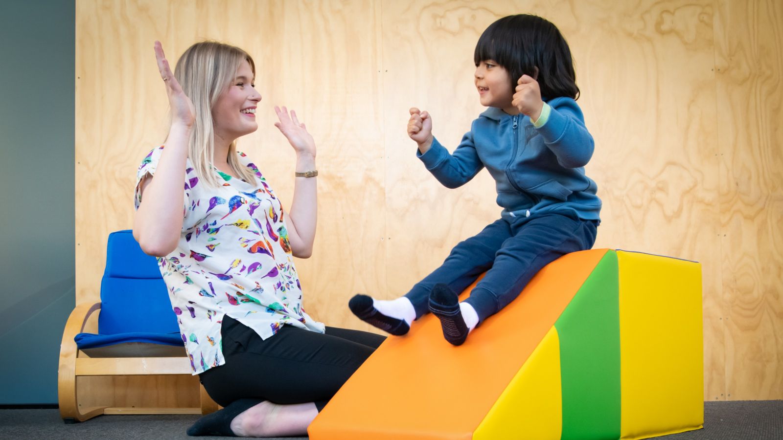 Staff member and child at the Autism Clinic