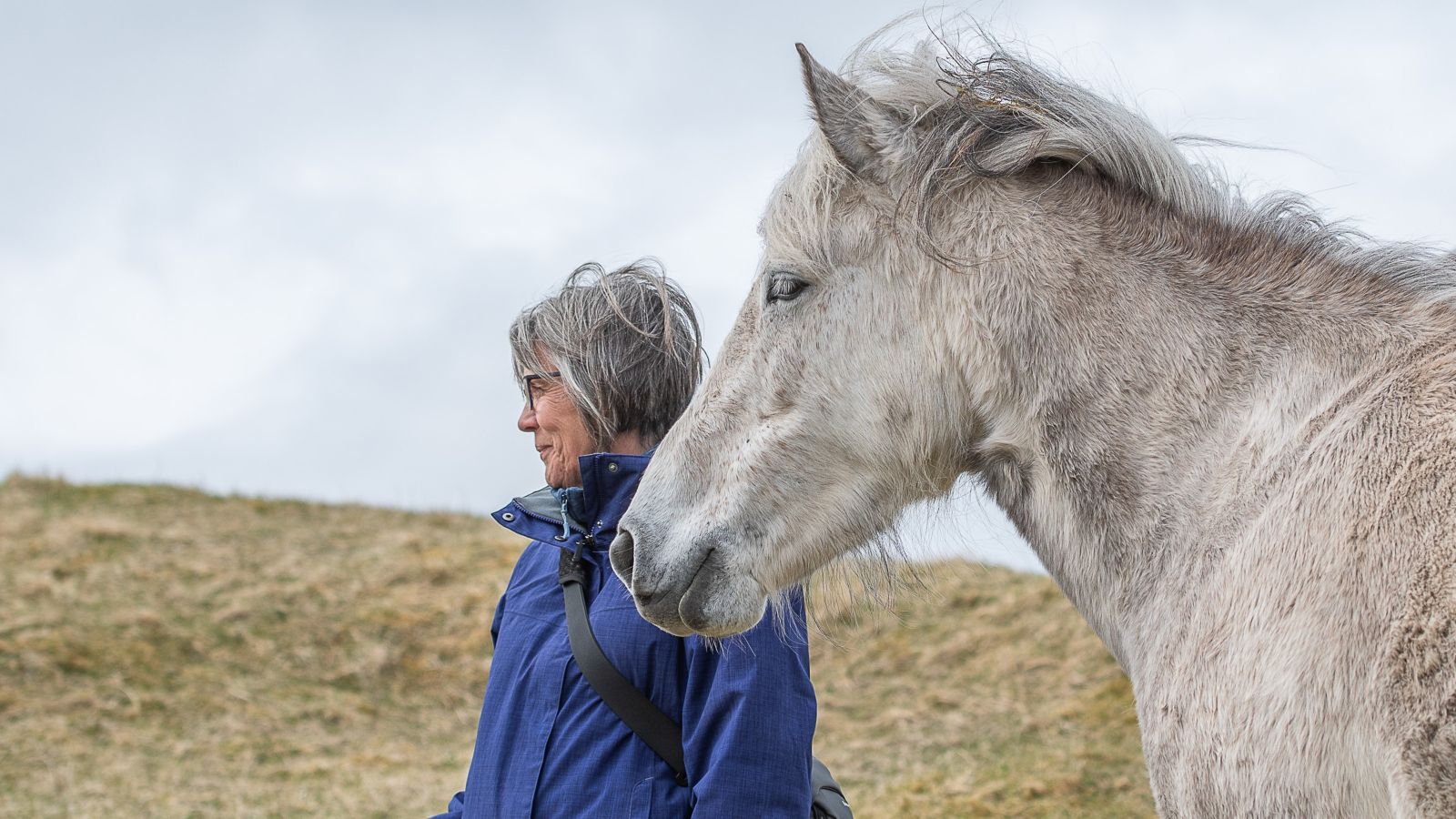 Abby Letteri in a field with an Eriskay pony