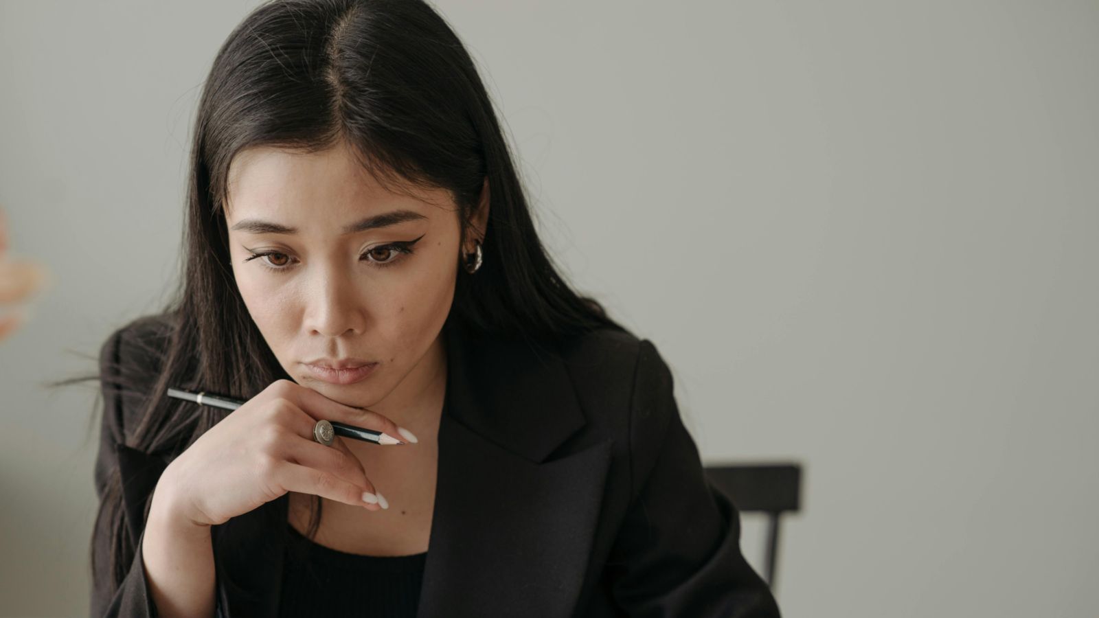 Woman staring at computer screen 