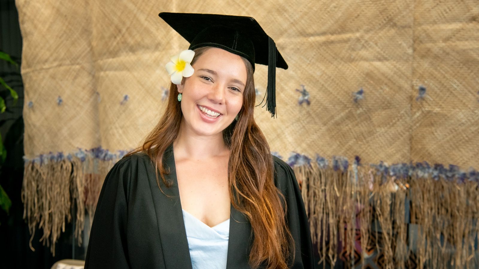 Meilani Payne in Graduation cap and robe