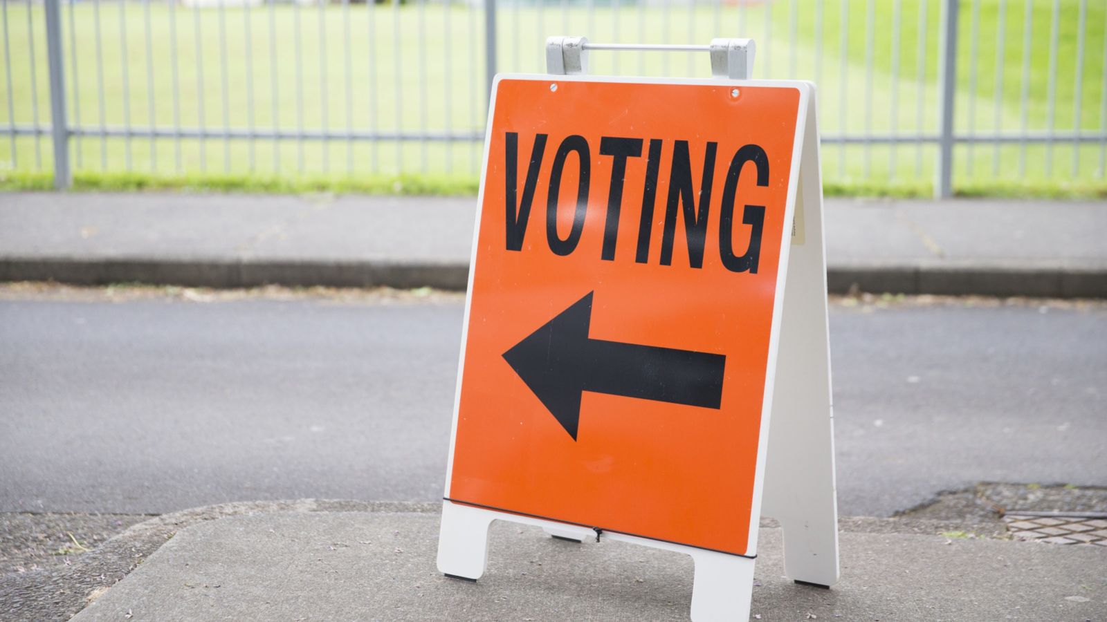 Voting sign on footpath 