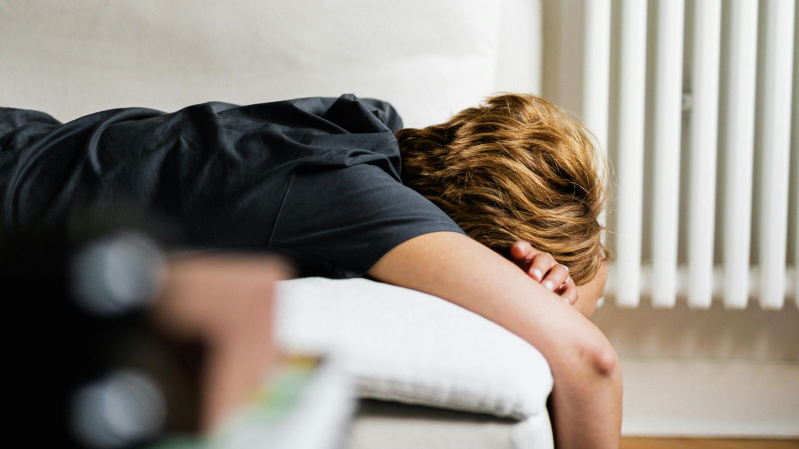 Person lying on couch 