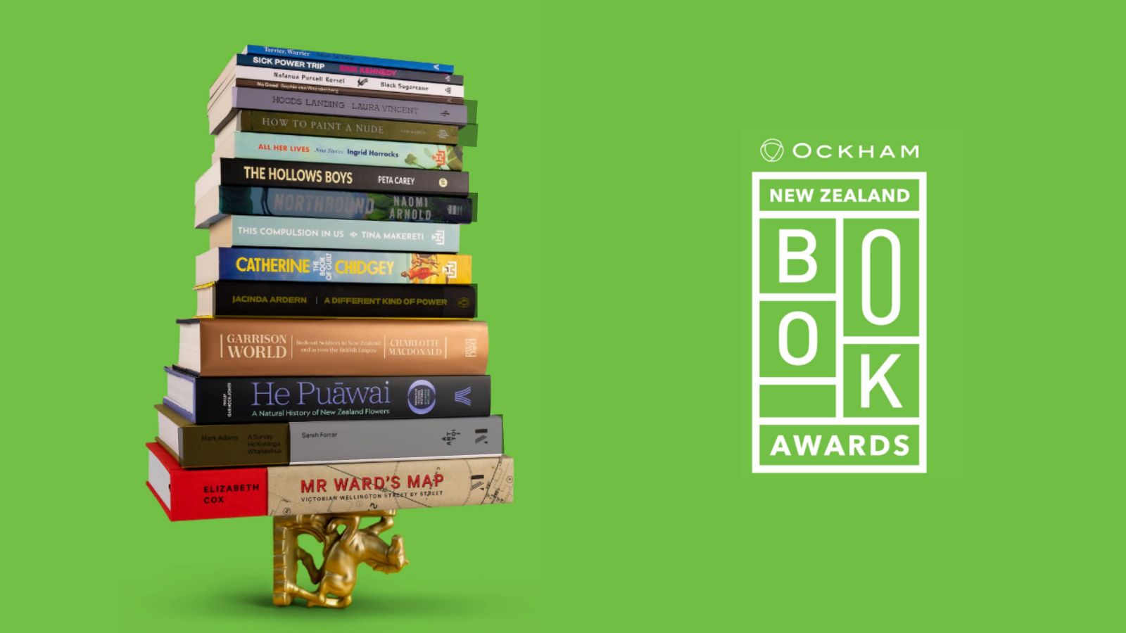 stack of books with titles and authors visible resting on a golden horse