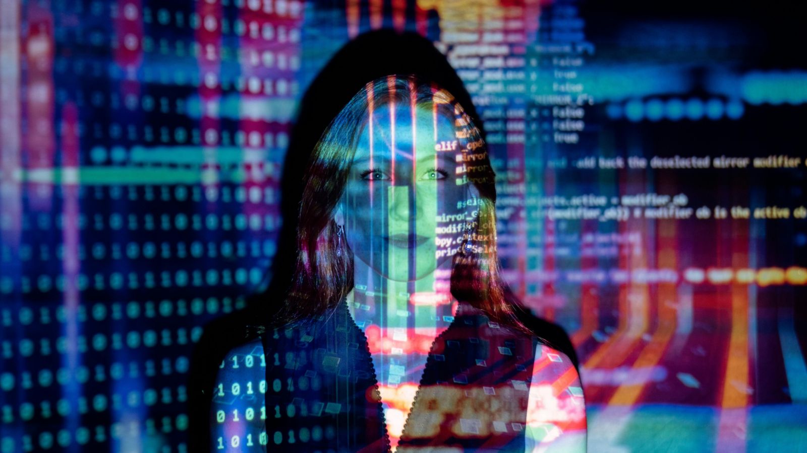 Woman with image of computer code across her face
