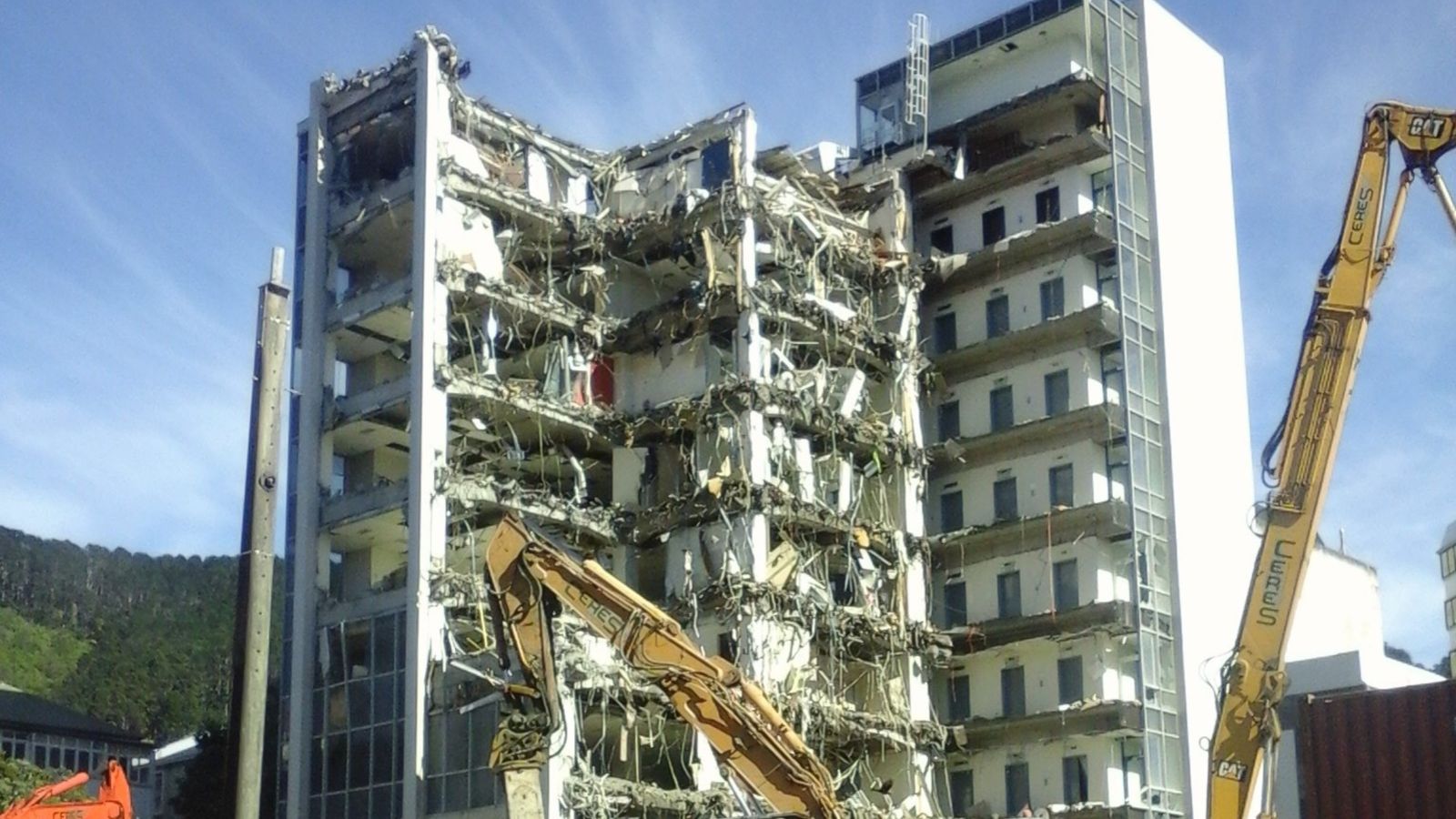 High-rise building being demolished