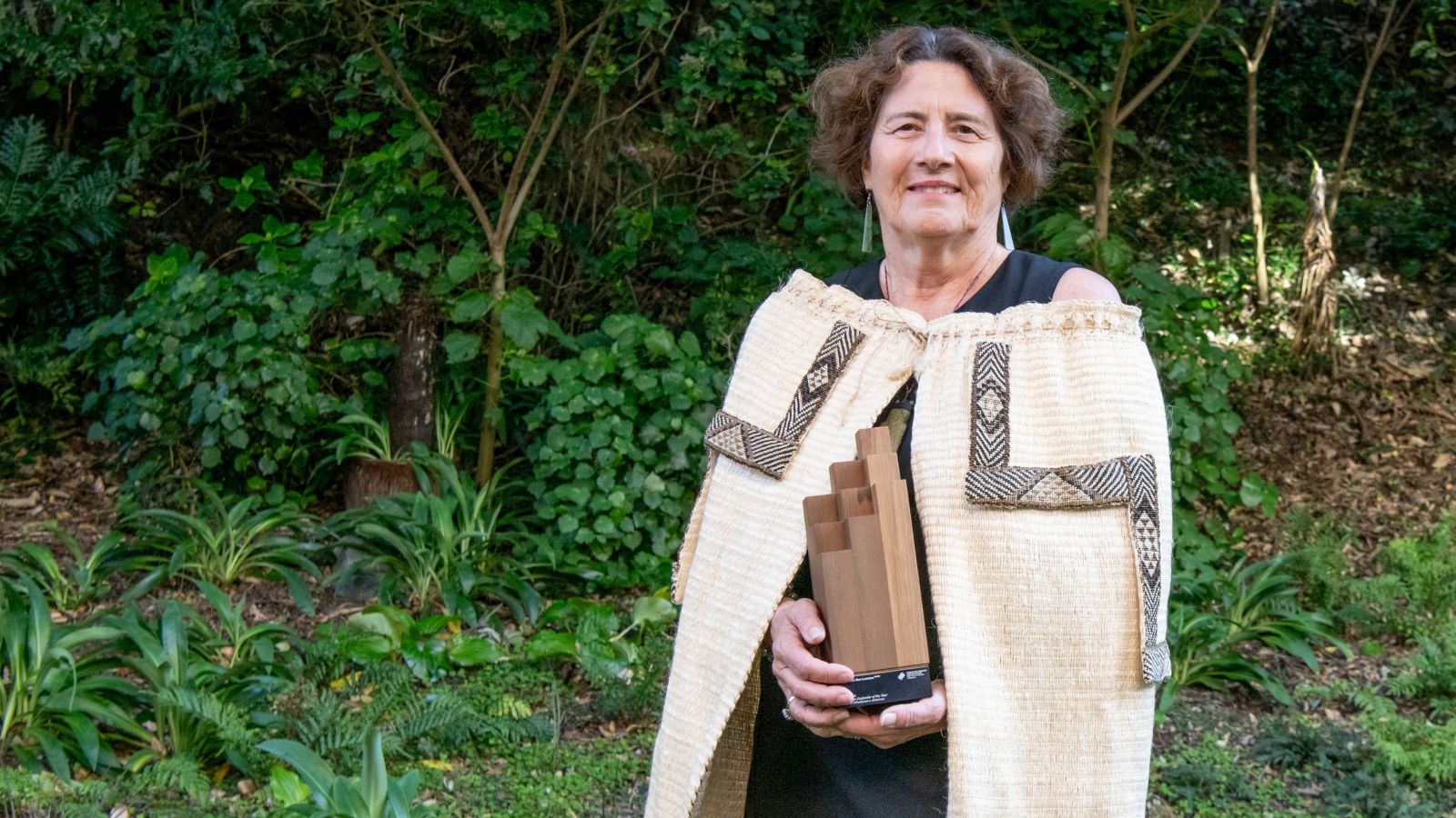 woman wearing a korowai cloak