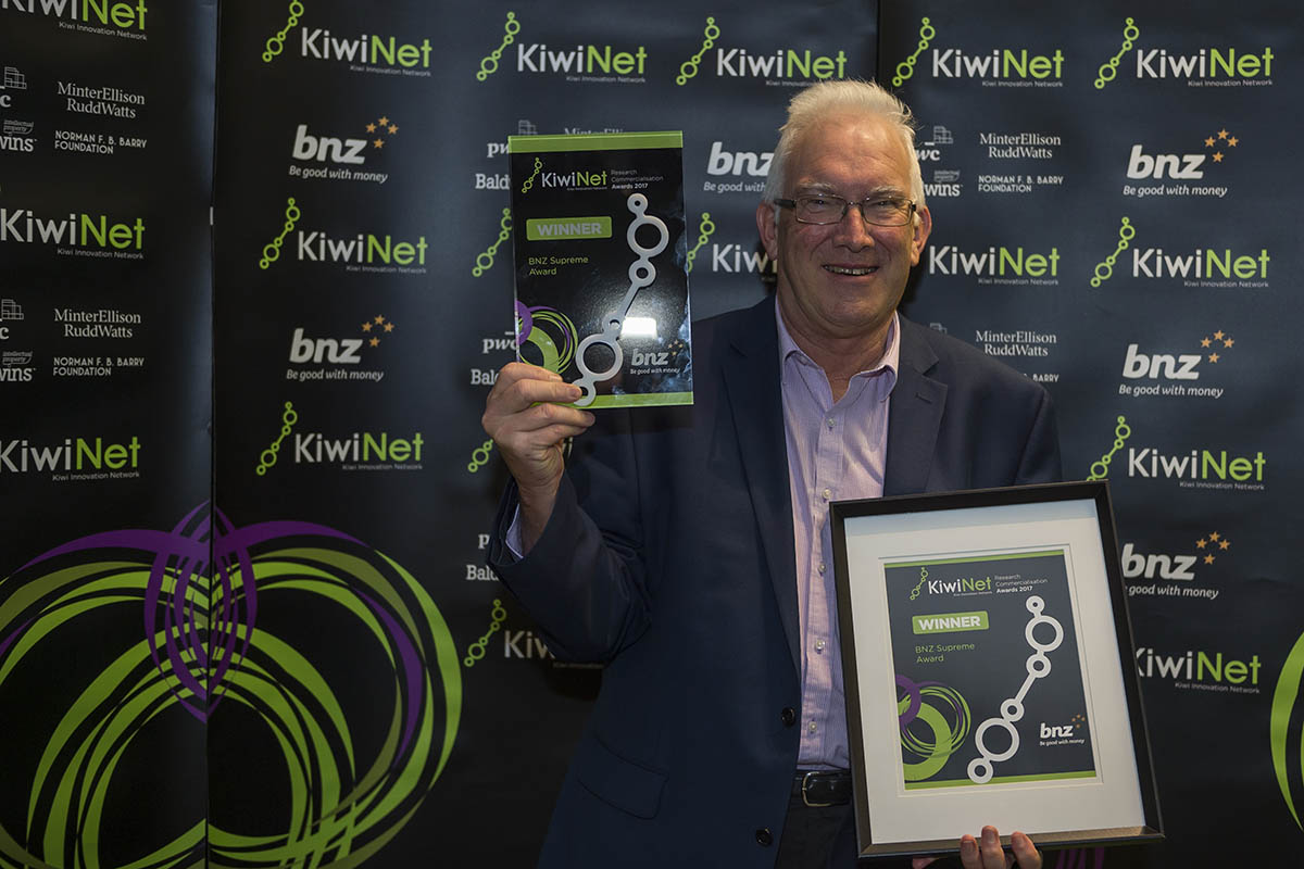 Professor Furneaux holding the Supreme Award and the Researcher Entrepreneur award at the 2017 Kiwinet Research Commercialisation Awards