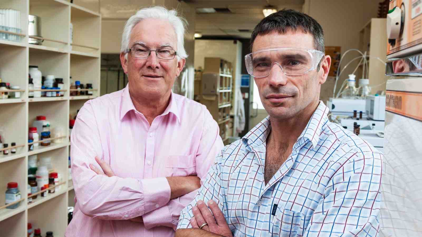 Professors Richard Furneaux and Gavin Painter standing in synthetic chemistry laboratory