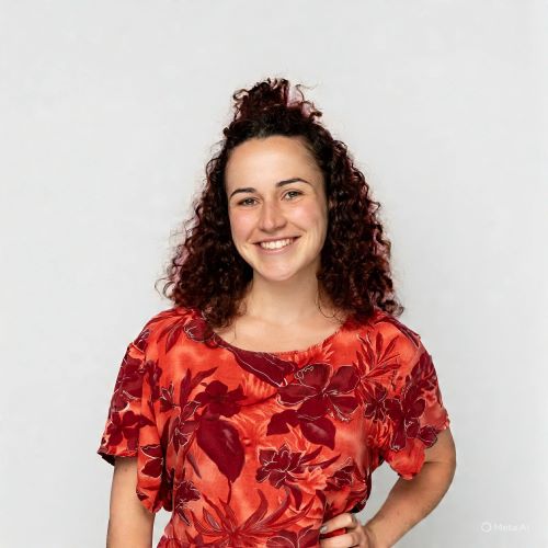 Portrait of Claudia Murdoch in front of a grey background