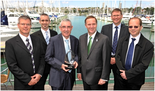 Sir Paul Callaghan, Robin Dykstra, Mark Hunter, Andrew Coy and Craig Eccles receiving the Prime Minister's award from Rt Hon John Key.
