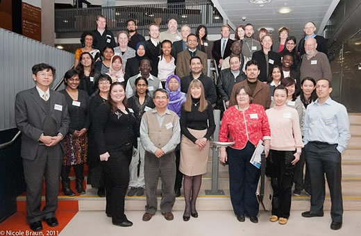 Head of School Val Hooper (centre) flanked by NZISDC participants and organisers of the event